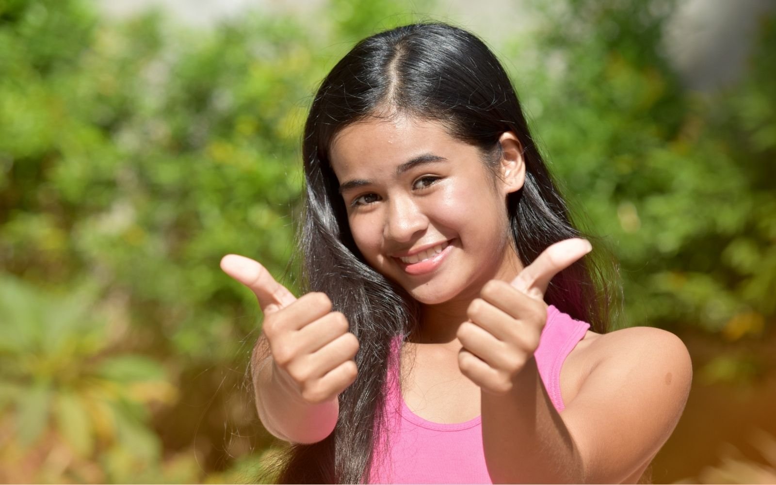 Girl Giving Thumbs Up