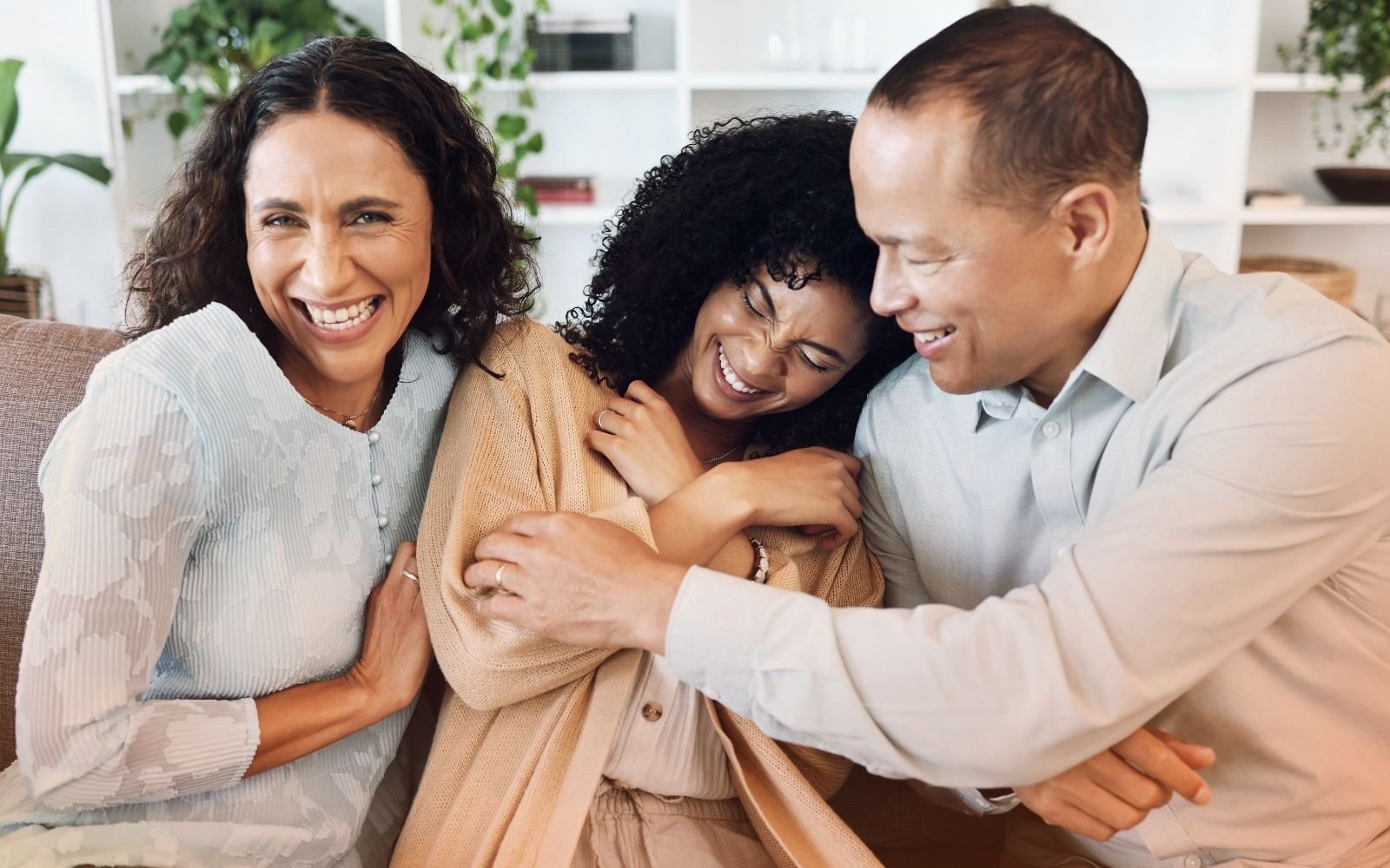 Teen Celebrating With Parents